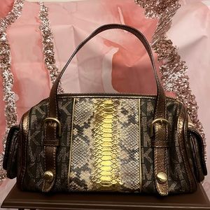 Beautiful Micheal Kor handbag approximately 13” length by 7” height by 6” width